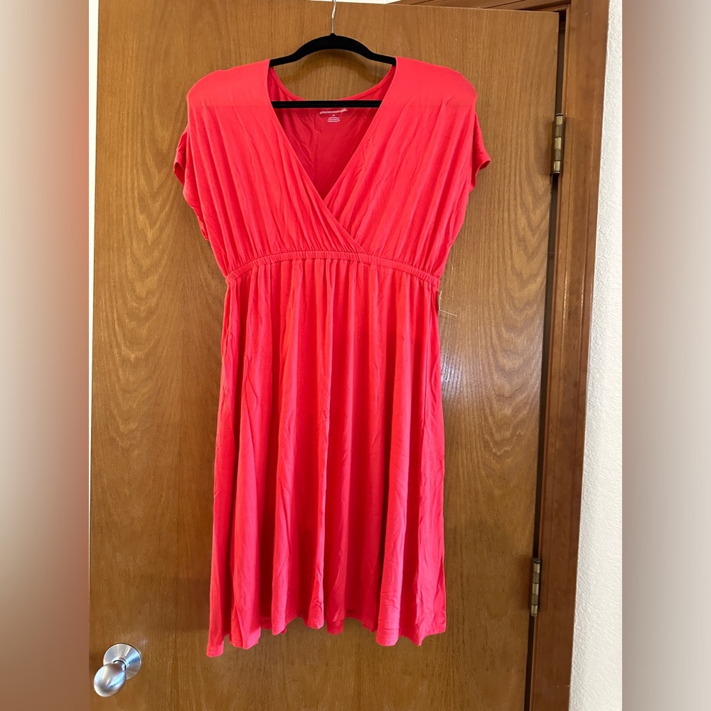 Super cute dress.  Stretchy.  NWT.  Medium.  Coral red.